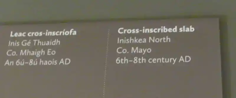 A flower-like cross on a stone